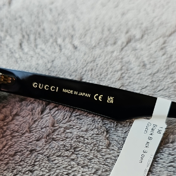 Gucci Black Sunglasses with Gold Case